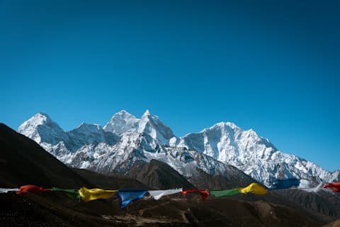 Himalayan peaks with prayer flags
